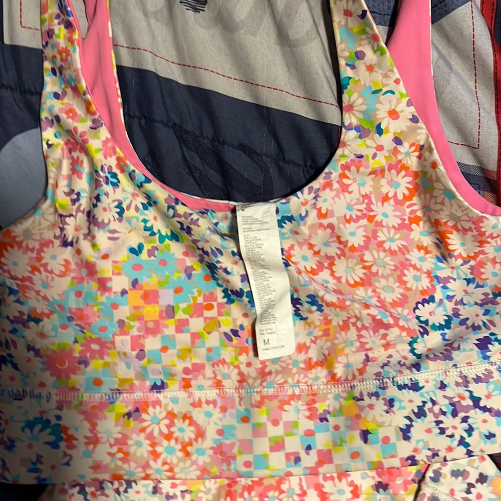 Multi colored, flower/checker board. Outfit worn once.